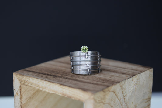 Fetch the bolt cutters Peridot adjustable ring