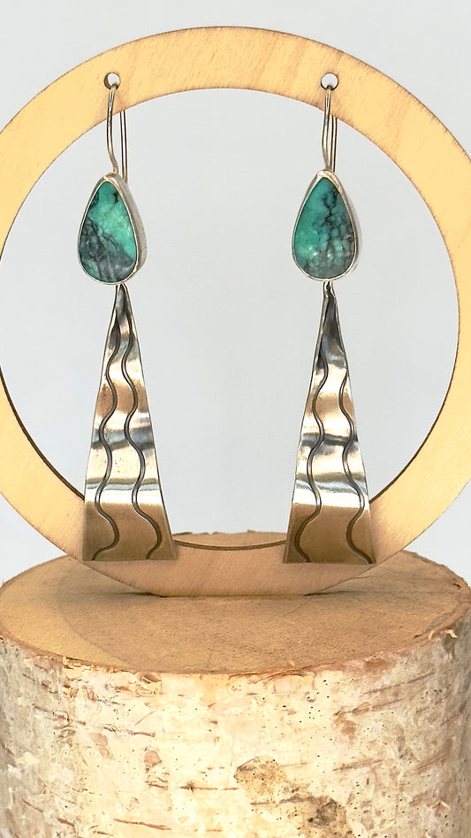 Sound Wave Ripple Design with tear drop turquoise